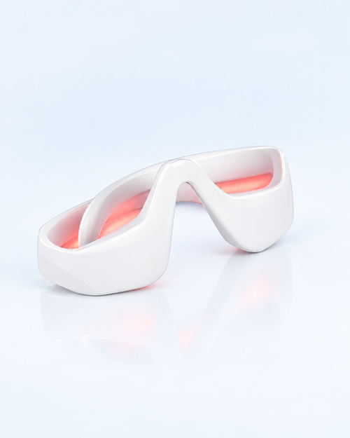 Himra red light eye massager with its light on, on a light blue background