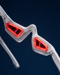 Close-up of the Himra eye glasses pads glowing red