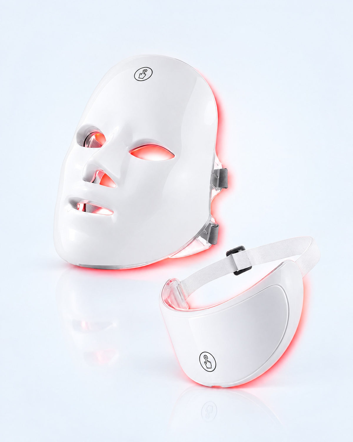 Himra LED face mask and neck piece glowing soft red on a light blue background