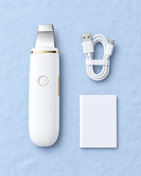 What’s in the box: spatula, USB cable, manual